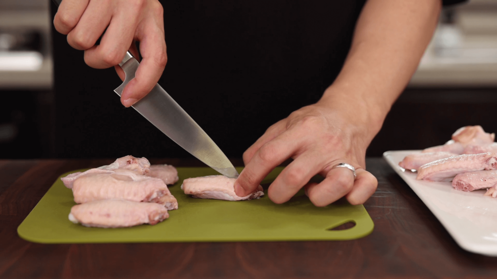 Make small cuts in the chicken with a knife