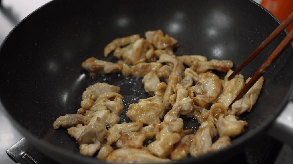 Cook chicken in a pan