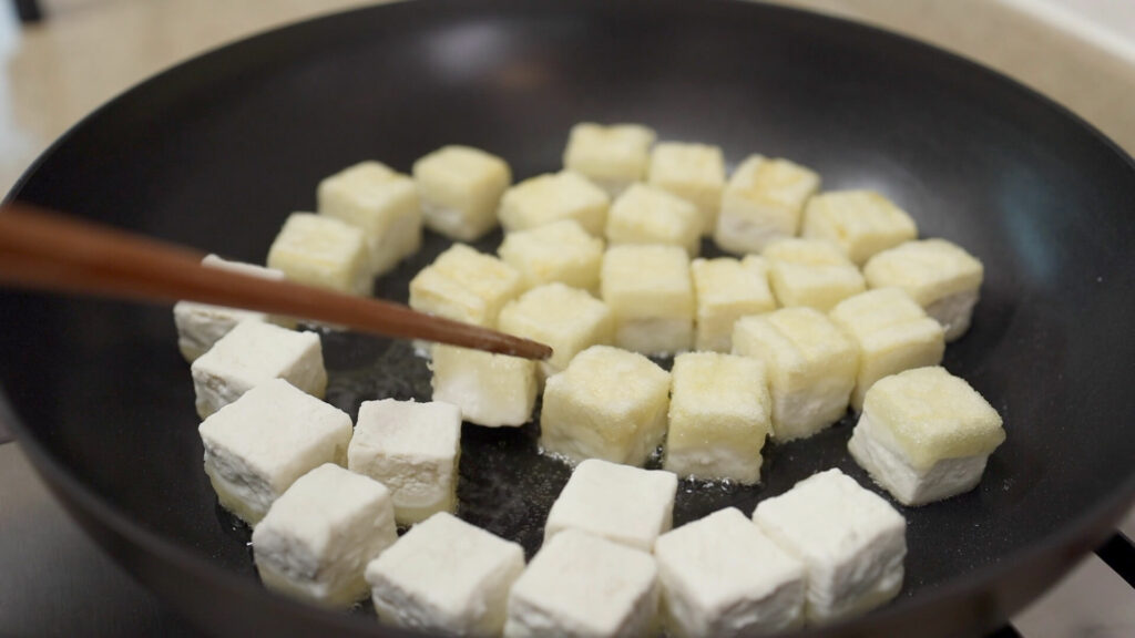 Fry tofu in a pan