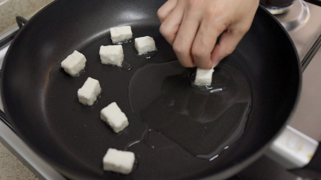 Fry tofu in a pan