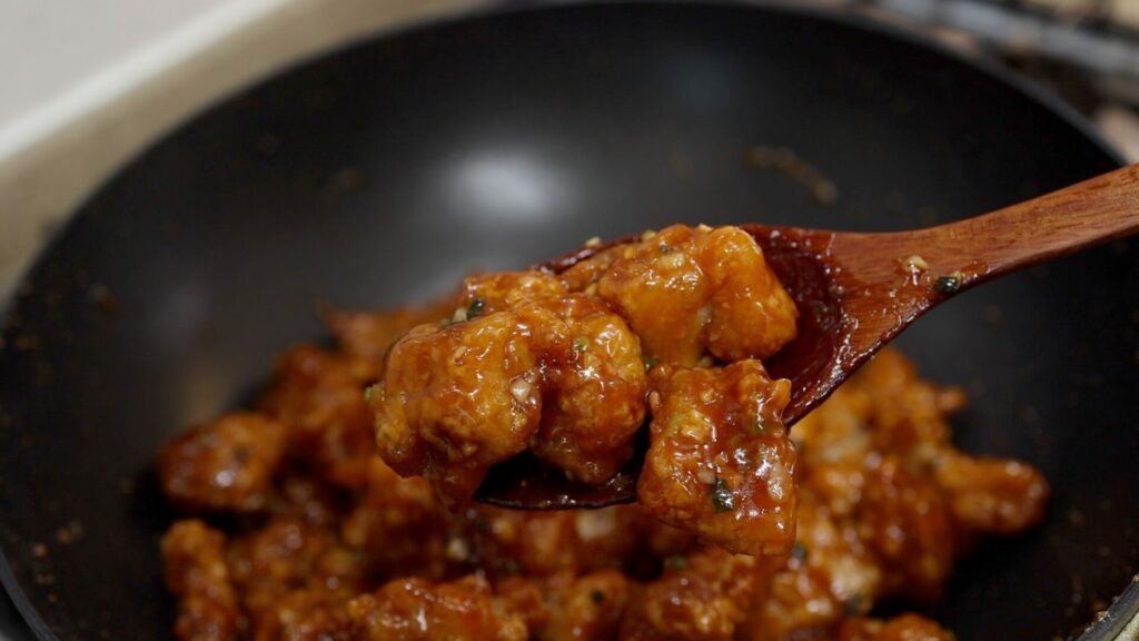 Sesame chicken in a pan