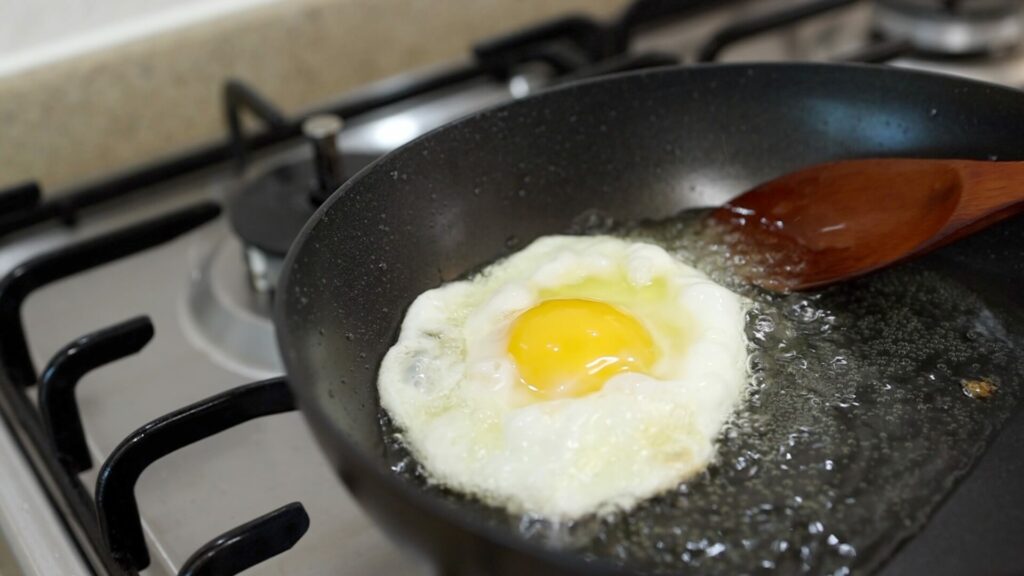 Make crispy egg in a pan