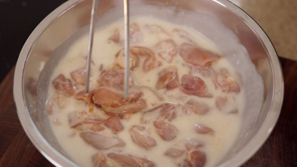 Dip Chicken Pieces into Wet Batter