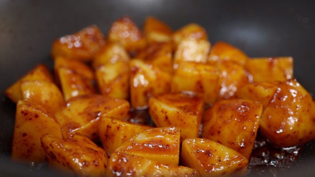Coating Potatoes with Sauce