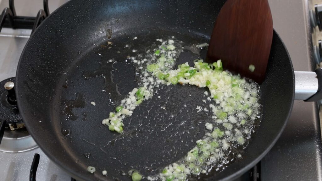 Saute aromatic vegetables