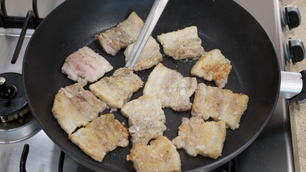 Sear pork belly