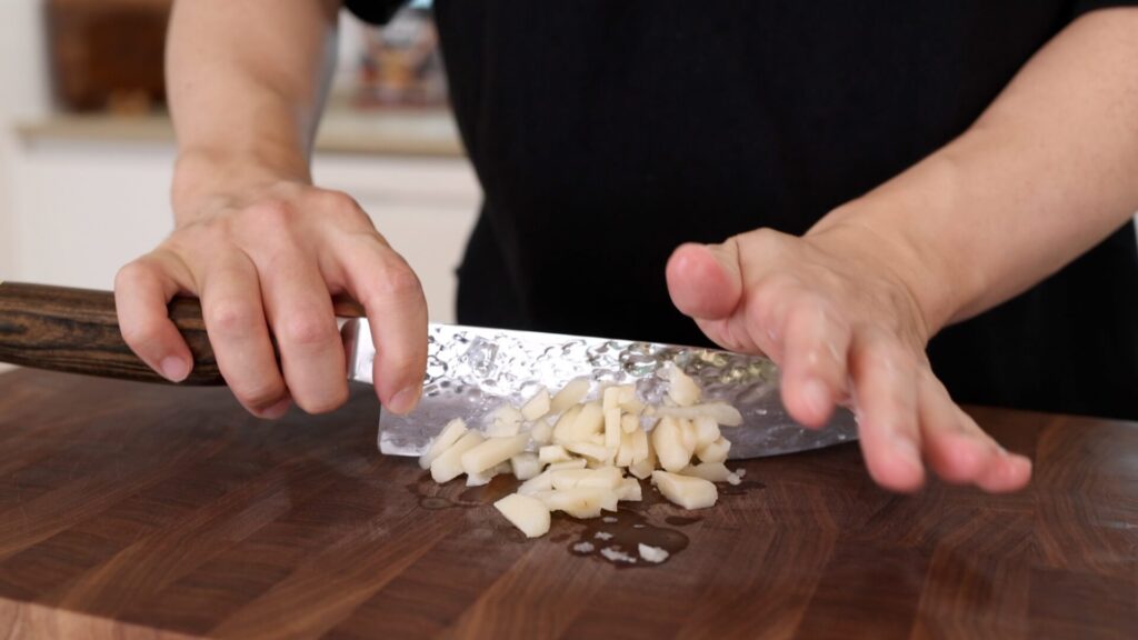 Finely chop water chestnuts
